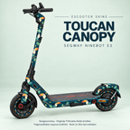 Toucan Canopy auf Ninebot E3 – Tukanmotive in Petrol, Ocker und Koralle; Originaltrittmatte bleibt, passende Felgen separat.