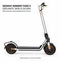 Segway Ninebot F40D II – weiße Skinflächen an Lenkkopf-Blende, Lenkstange vorn, Gabelverkleidung, den Seitenstreifen vom Rahmenhals bis zur Hinterachse und am hinteren Kotflügel. Felgenringe, Kabel, Reflektoren und Trittmatte bleiben frei; Scooter nicht enthalten.